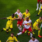 The Red Bulls defend on a Crew set piece